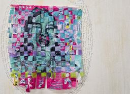 A woven portrait at St. Andrew’s Parish Hall made from strips of pink and teal sanitary-product wrappers.
