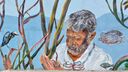 A section of the Guardians of Fort Kochi wall mural showing an old man’s face among painted mangrove roots, with a kingfisher and fish around him.