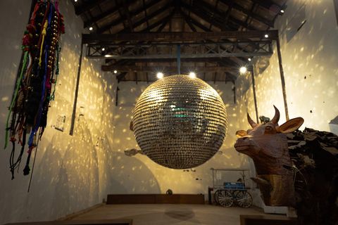 Exhibition view inside Anand Warehouse, Kochi-Muziris Biennale 2025–26.