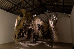 Exhibition view inside Anand Warehouse, Kochi-Muziris Biennale 2025–26.