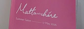 A pink sign reading ‘Mattanchere Summer Salon, 17 May 2026’ at Muziris Contemporary.