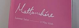 A pink sign reading ‘Mattanchere Summer Salon, 17 May 2026’ at Muziris Contemporary.