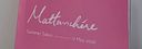 A pink sign reading ‘Mattanchere Summer Salon, 17 May 2026’ at Muziris Contemporary.